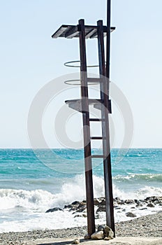 rescue hut on a sandy beach, safe relax by the ocean, a beautiful sunny day