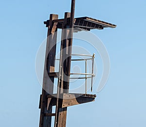 rescue hut on a sandy beach, safe relax by the ocean, a beautiful sunny day