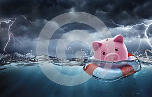 Rescue Savings and Banking Insurance Concept - Piggy Bank At Risk To Drowning In Debt