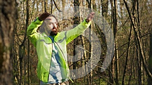 Rescue squad leader guiding route through the woods to collect evidence