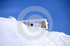 The rescue station in snowy winter mountains