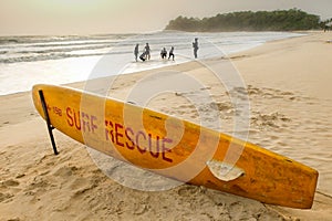 Rescue surf board lying on the sand,Palolem beach,ready for use during off season,southern Goa,India