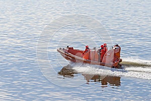 Rescue team on a motor boat photo