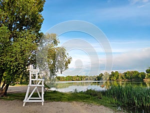 Rescue tower on the riverside landscape copy space