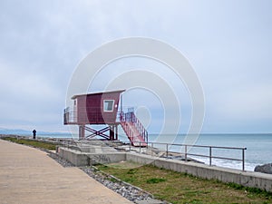 Rescue tower on the sea in winter. Empty rescue station. Cloudy weather. Black Sea