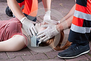 Rescuers using cervical collar