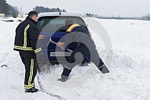 Rescuers work with wrench