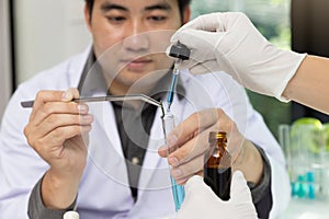 Research and development concept, Laboratory scientist working at lab with test tubes about medicine