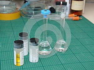 Research lab desk with samples in test-tubes