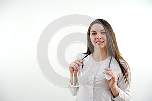 Research, woman doctor with computer and at her desk of her workplace office with a lens flare. Networking, connectivity