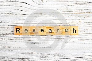 RESEARCH word made with wooden blocks concept