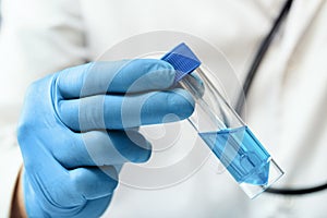 Researcher in the laboratory preparing a sample of antibiotic for the vaccination campaign