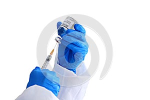 The reasearcher,scientist,doctor,or chemist in virus protective suit use syringes vacuuming vaccine to test with animal treatment