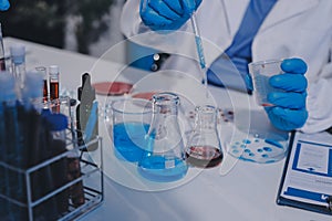 Researcher using a professional microscope