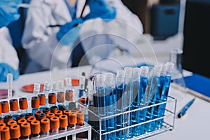 Researcher using a professional microscope