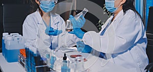 Researcher using a professional microscope