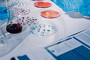 Researcher using a professional microscope