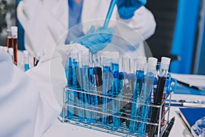 Researcher using a professional microscope