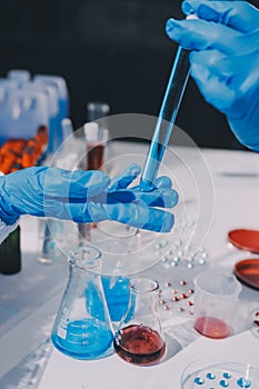 Researcher using a professional microscope