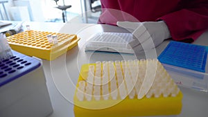 Researchers or physicians pipetted and processed patient samples in the laboratory. Cancer research and vaccine concept