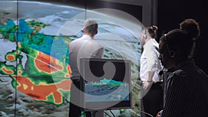 Researchers tracking hurricane on monitor