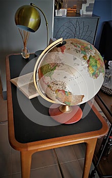 Researching with a desk globe