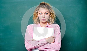 Researching Project via Internet. Education via Internet. modern technology. girl in modern school. student in glasses