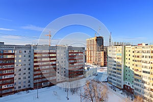 Resedential area with cranes and buildings