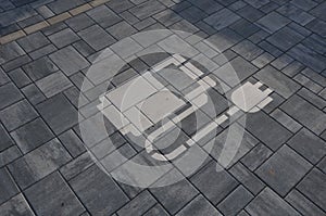 Reservation of road signs for electric cars. Charging station with gas station symbol with cable and plug for charging the electri