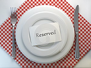 Reserved card on a restaurant table setting. Top view. Mock up.