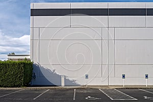 Reserved disabled spaces at the parking lot of a modern office building