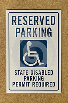 Reserved parking sign mounted on a wall