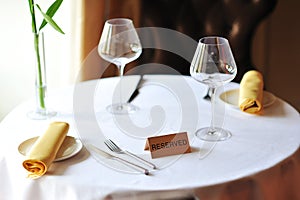 Reserved sign on a restaurant table