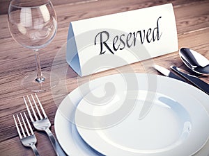 Reserved sign on a restaurant table