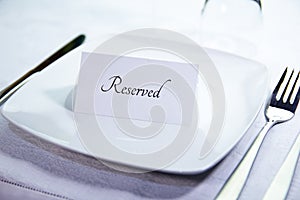 Reserved table place close up