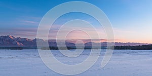 The reserved Tunkinskaya valley on a sunrise in early spring. Republic of Buryatia, Russia, Siberia