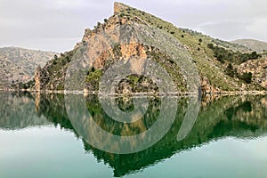 Reservoir dam at Quentar on cloudy weather, Granada province, Andalusia