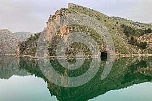 Reservoir dam at Quentar on cloudy weather, Granada province, Andalusia