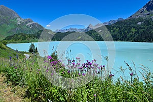 Reservoir lake with mountains epic landscape. Idyllic reservoir Kops lake at 1800 m in austrian Galtur, Vorarlberg