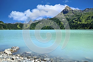 Reservoir lake with mountains epic landscape. Idyllic reservoir Kops lake at 1800 m in austrian Galtur, Vorarlberg