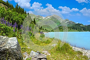 Reservoir lake with mountains epic landscape. Idyllic reservoir Kops lake at 1800 m in austrian Galtur, Vorarlberg