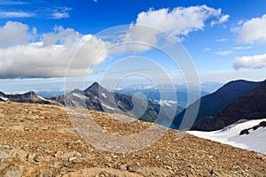 Reservoir Wasserfallboden and mountain snow panorama with summit Kitzsteinhorn in Glockner Group, Austria