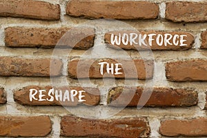 Reshape the workforce and support symbol. Concept words Reshape the workforce on red brick wall. Beautiful red brick wall