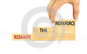 Reshape the workforce and support symbol. Concept words Reshape the workforce on wooden blocks. Businessman hand. Beautiful white