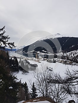 Resia Frozen Lake mountain country on the lake Alpi les alpes the alps italy i