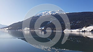 Resia Frozen Lake mountain country on the lake Alpi les alpes the alps italy i