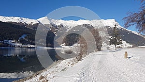 Resia Frozen Lake mountain country on the lake Alpi les alpes the alps italy i
