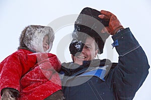 A resident of the tundra, indigenous residents of the Far North, tundra, open area, Little girl throw up, Little girl  in national