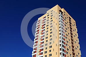 Residental building against dark blue sky