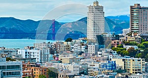 Residential apartment buildings San Francisco aerial of city with Golden Gate Bridge, CA